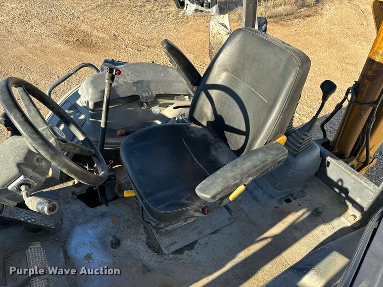 image for item NM9107 1999 New Holland 555E  backhoe