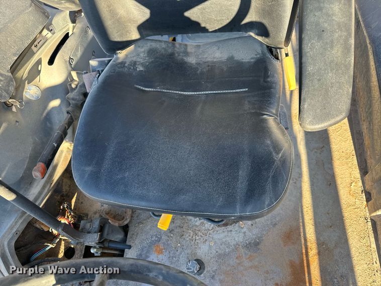 image for item NM9107 1999 New Holland 555E  backhoe