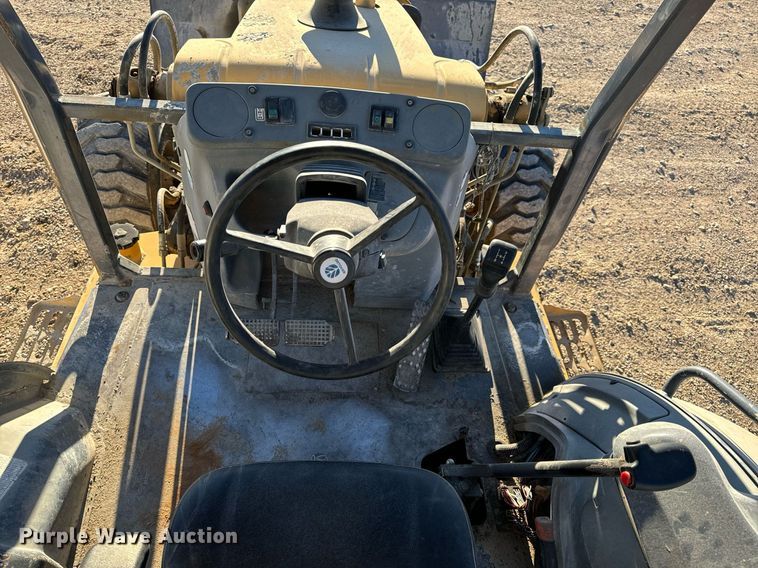 image for item NM9107 1999 New Holland 555E  backhoe