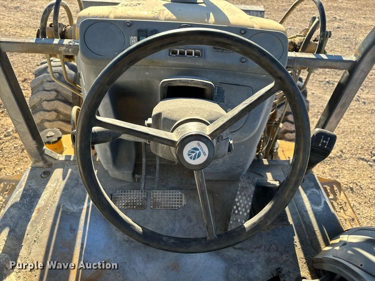 image for item NM9107 1999 New Holland 555E  backhoe