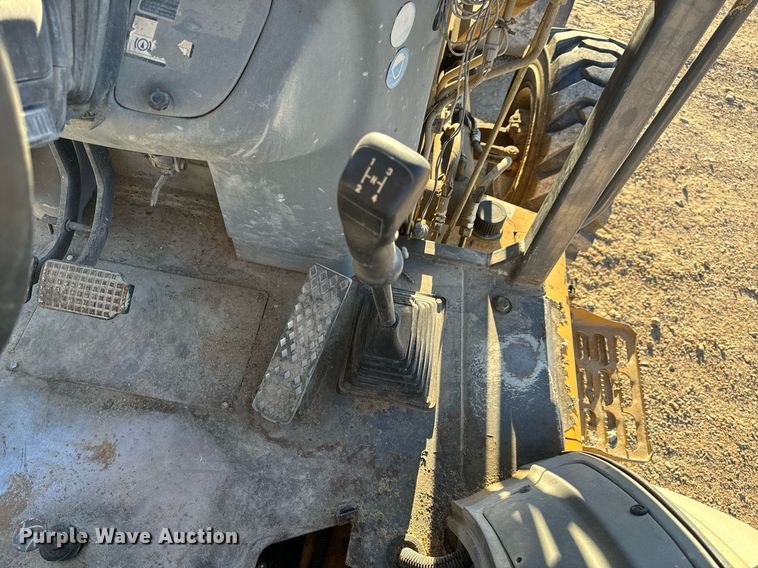 image for item NM9107 1999 New Holland 555E  backhoe