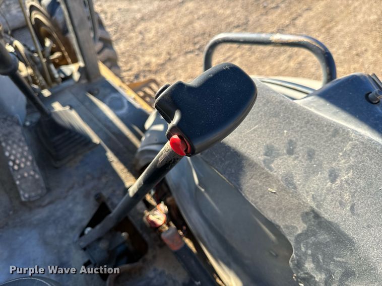 image for item NM9107 1999 New Holland 555E  backhoe