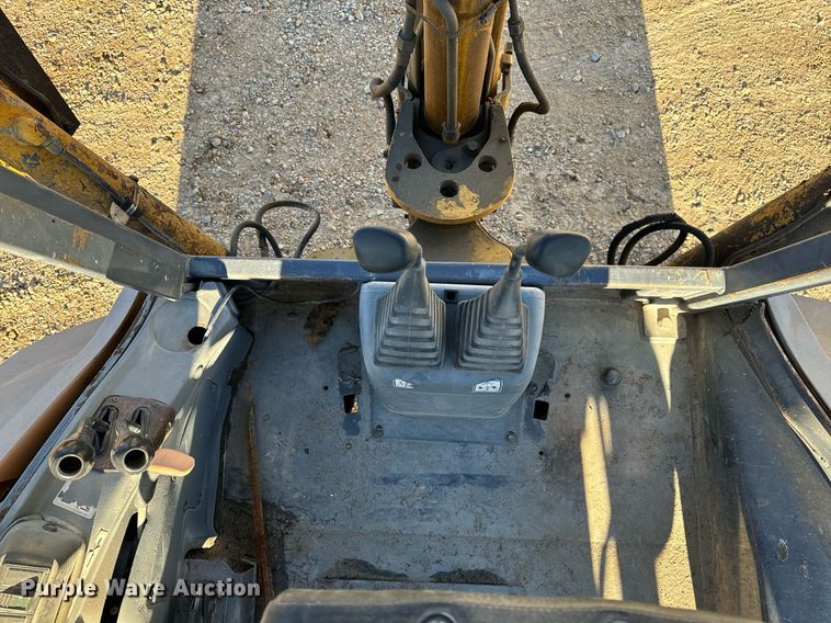 image for item NM9107 1999 New Holland 555E  backhoe