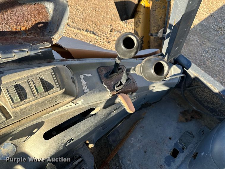 image for item NM9107 1999 New Holland 555E  backhoe