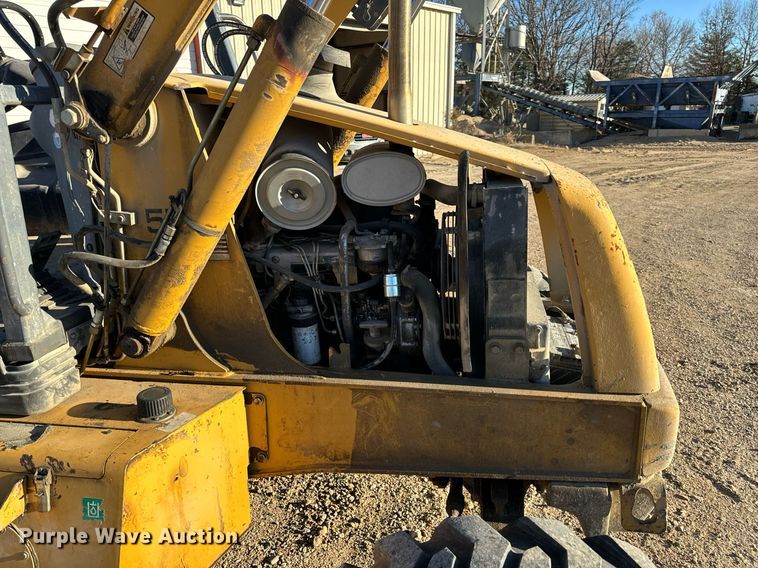 image for item NM9107 1999 New Holland 555E  backhoe