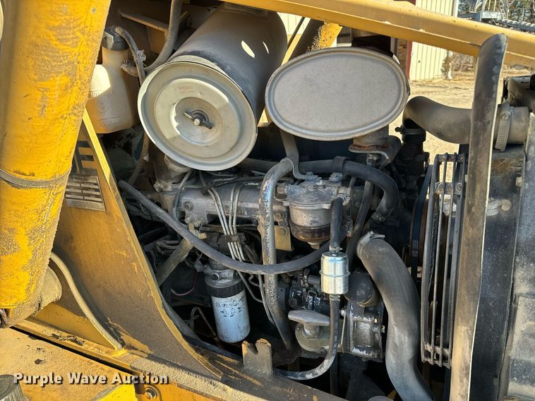 image for item NM9107 1999 New Holland 555E  backhoe