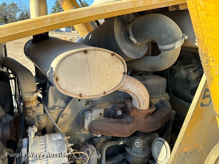 image for item NM9107 1999 New Holland 555E  backhoe