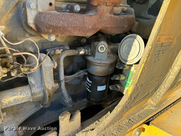 image for item NM9107 1999 New Holland 555E  backhoe