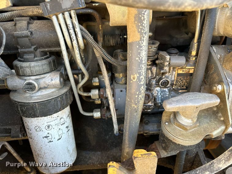 image for item NM9107 1999 New Holland 555E  backhoe