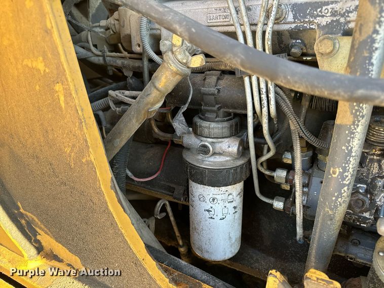 image for item NM9107 1999 New Holland 555E  backhoe