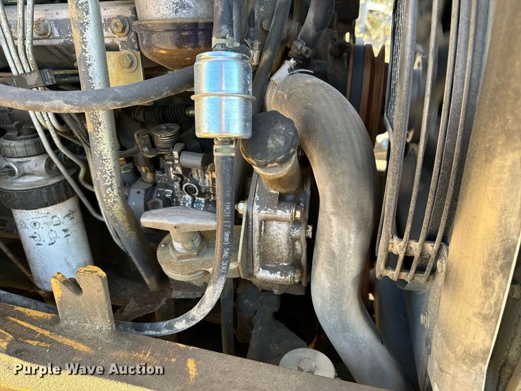 image for item NM9107 1999 New Holland 555E  backhoe