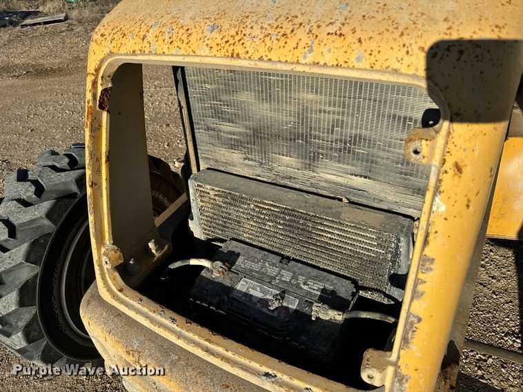 image for item NM9107 1999 New Holland 555E  backhoe