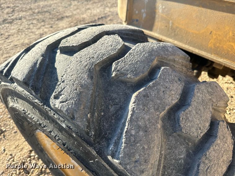 image for item NM9107 1999 New Holland 555E  backhoe