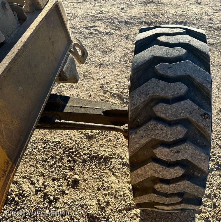 image for item NM9107 1999 New Holland 555E  backhoe