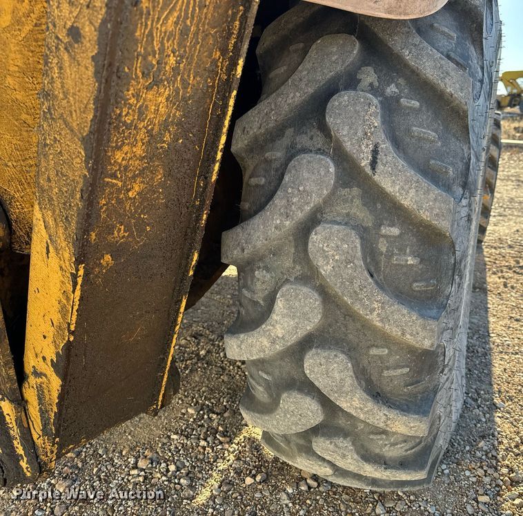 image for item NM9107 1999 New Holland 555E  backhoe