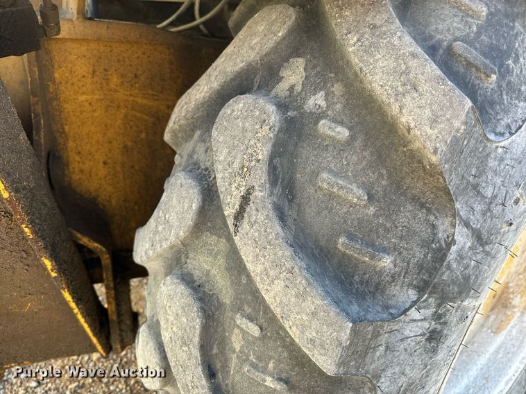 image for item NM9107 1999 New Holland 555E  backhoe