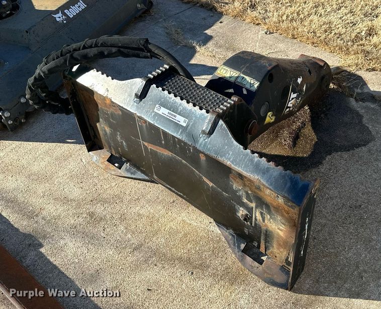 image for item NS9090 Caterpillar H55D  skid steer breaker