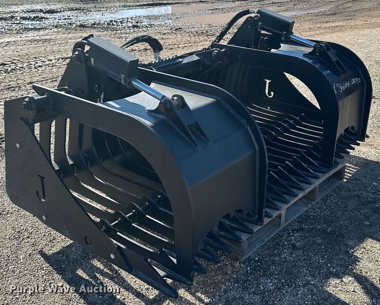 Jenkins skid steer rock grapple bucket in Lawrence, KS Item OF9144