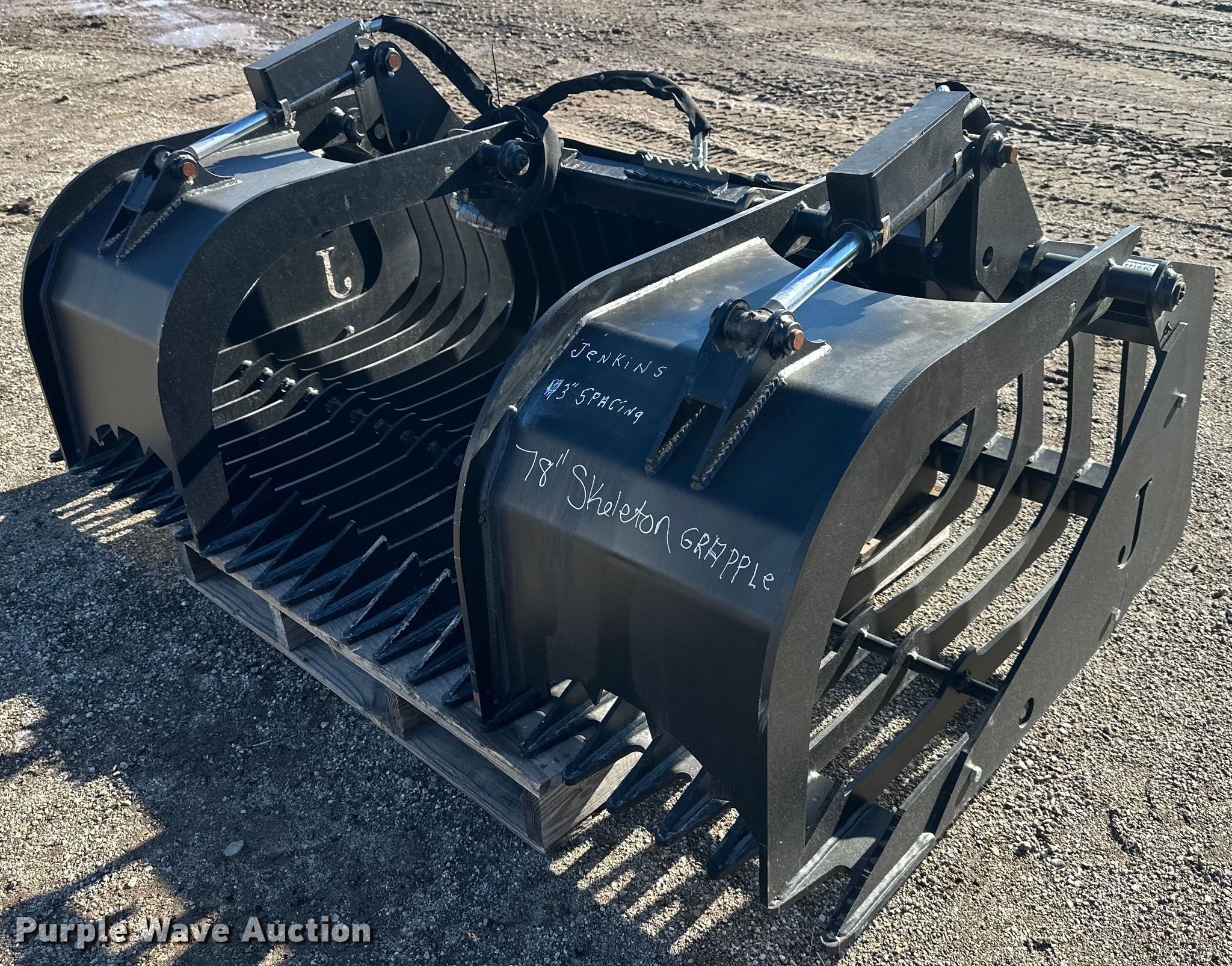 Jenkins skid steer rock grapple bucket in Lawrence, KS Item OF9144