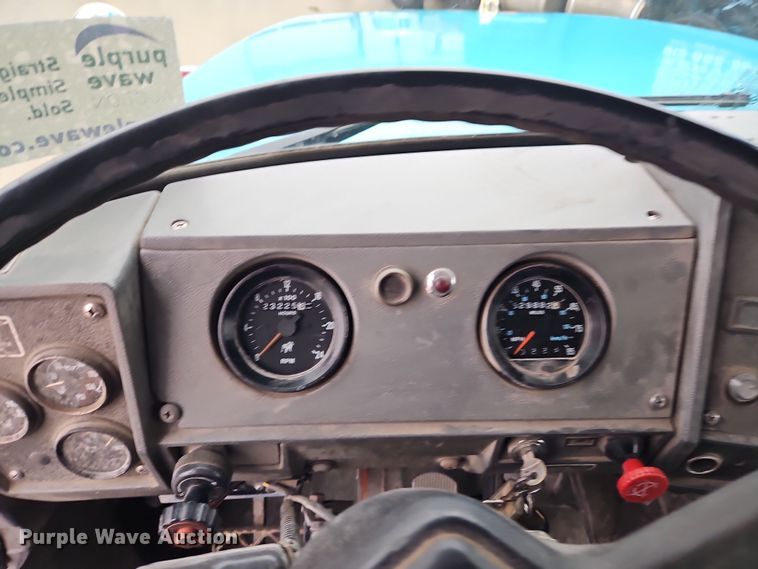 image for item DN7140 1996 Mack  roll-off container truck