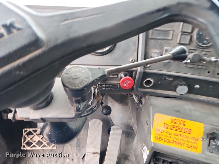 image for item DN7140 1996 Mack  roll-off container truck