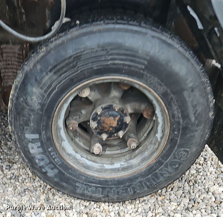 image for item DN7140 1996 Mack  roll-off container truck