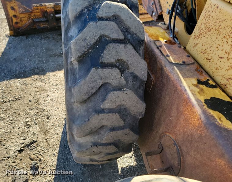 image for item KU9049 1996 John Deere 770BH  motor grader