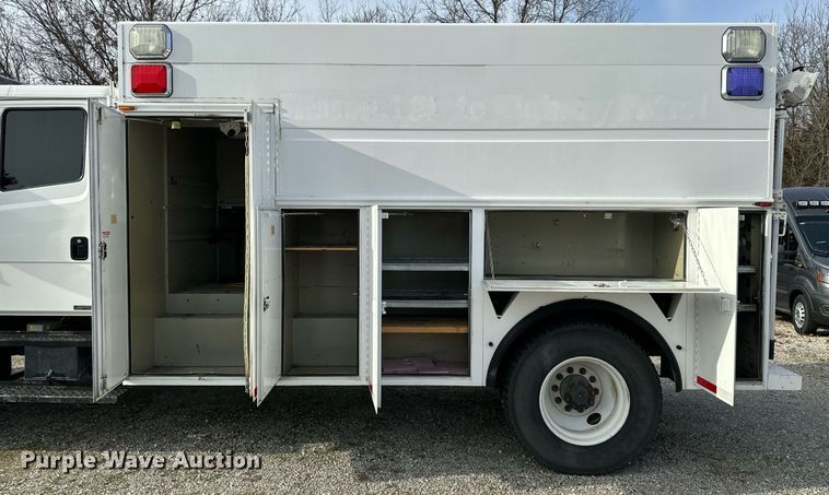 image for item NM9182 2004 Freightliner FL70  utility / service truck