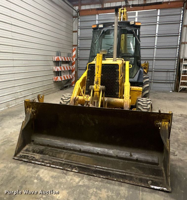 image for item OF9199 1992 John Deere 310D  backhoe