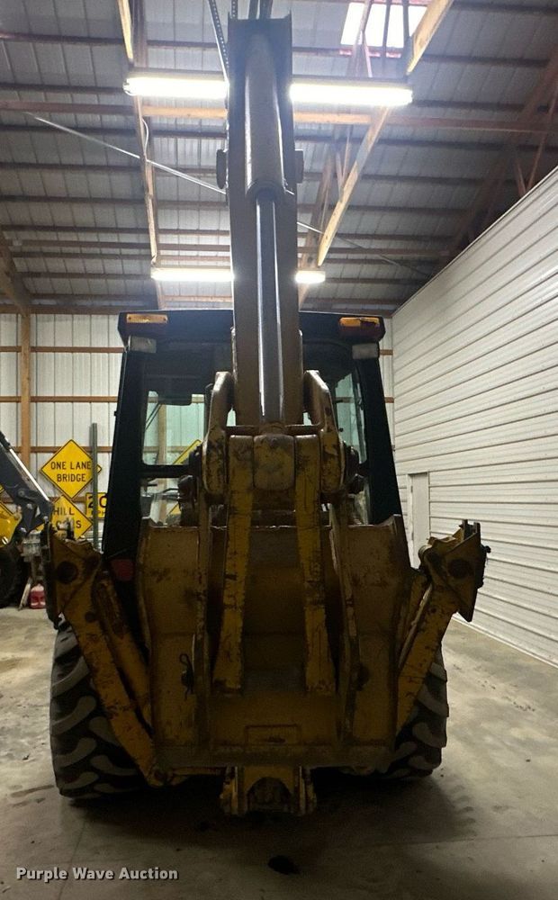 image for item OF9199 1992 John Deere 310D  backhoe