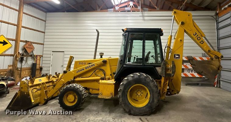 image for item OF9199 1992 John Deere 310D  backhoe