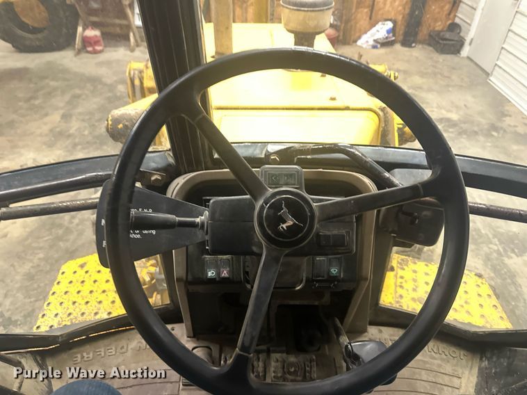 image for item OF9199 1992 John Deere 310D  backhoe