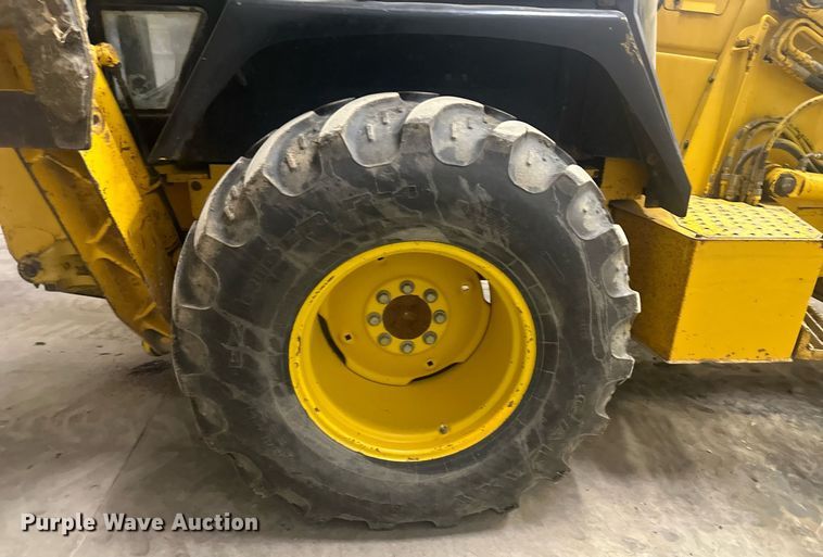 image for item OF9199 1992 John Deere 310D  backhoe