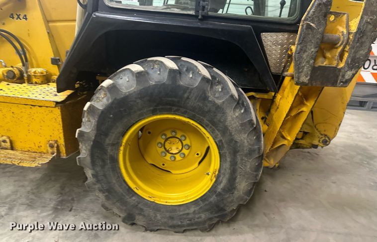 image for item OF9199 1992 John Deere 310D  backhoe