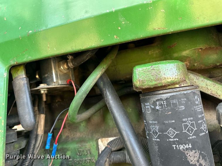 image for item EK9890 1993 John Deere 6200 Gilbert  tractor