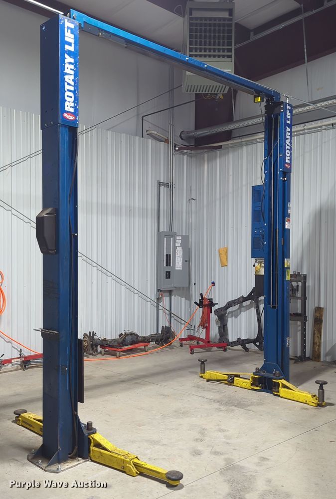 image for item OL9199 Rotary  two post automotive lift