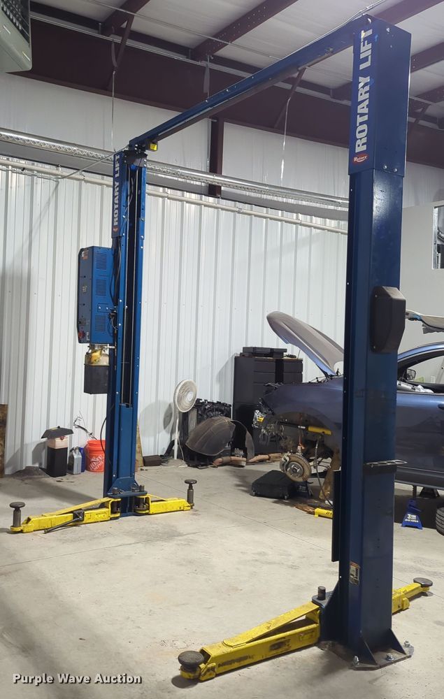 image for item OL9199 Rotary  two post automotive lift
