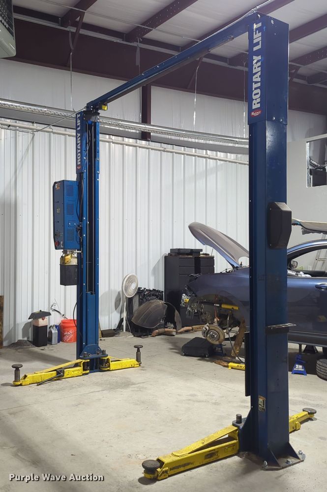 image for item OL9199 Rotary  two post automotive lift