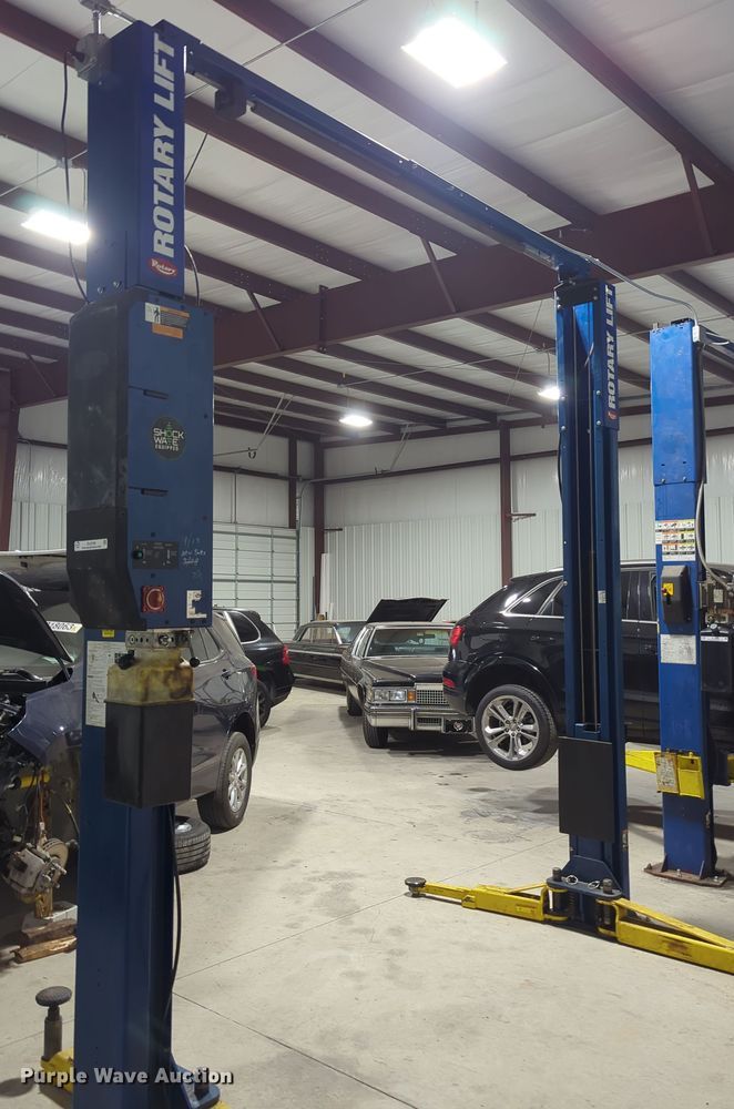 image for item OL9199 Rotary  two post automotive lift