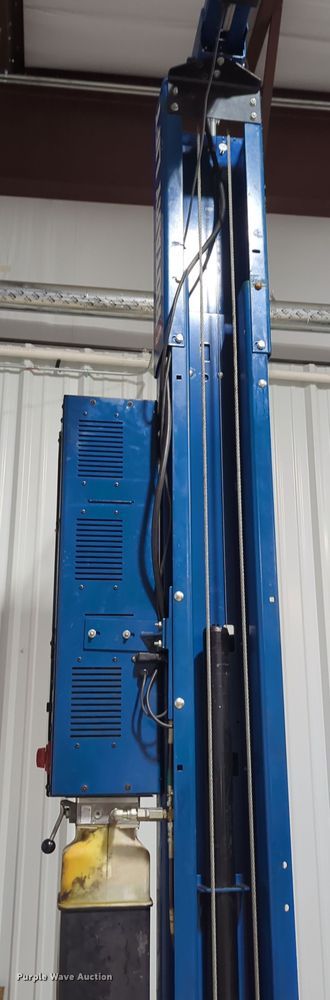 image for item OL9199 Rotary  two post automotive lift