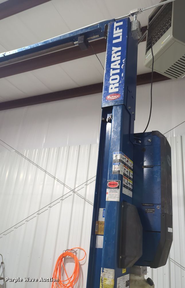 image for item OL9199 Rotary  two post automotive lift