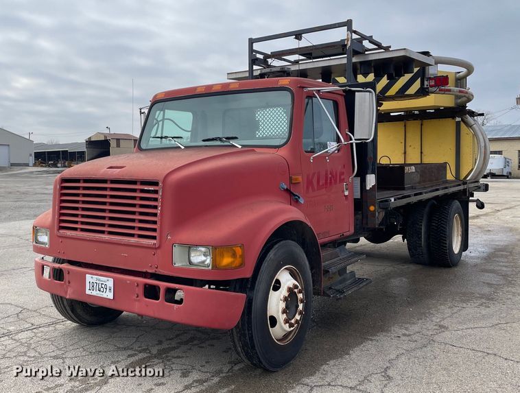 image for item DP0265 2000 International  4700 flatbed truck with crash attenuator