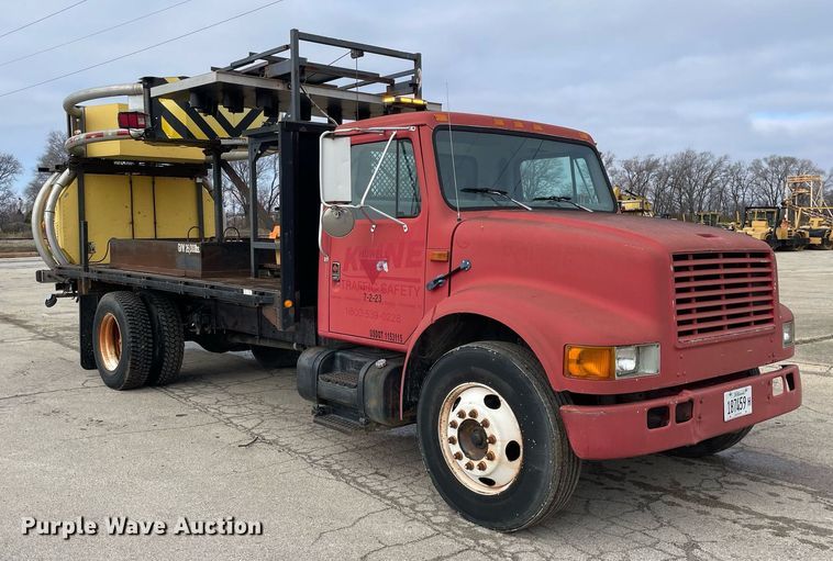 image for item DP0265 2000 International  4700 flatbed truck with crash attenuator