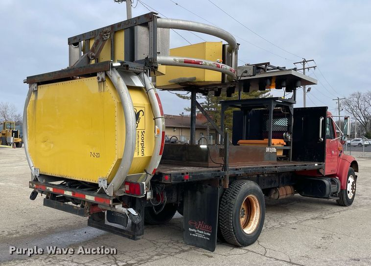 image for item DP0265 2000 International  4700 flatbed truck with crash attenuator