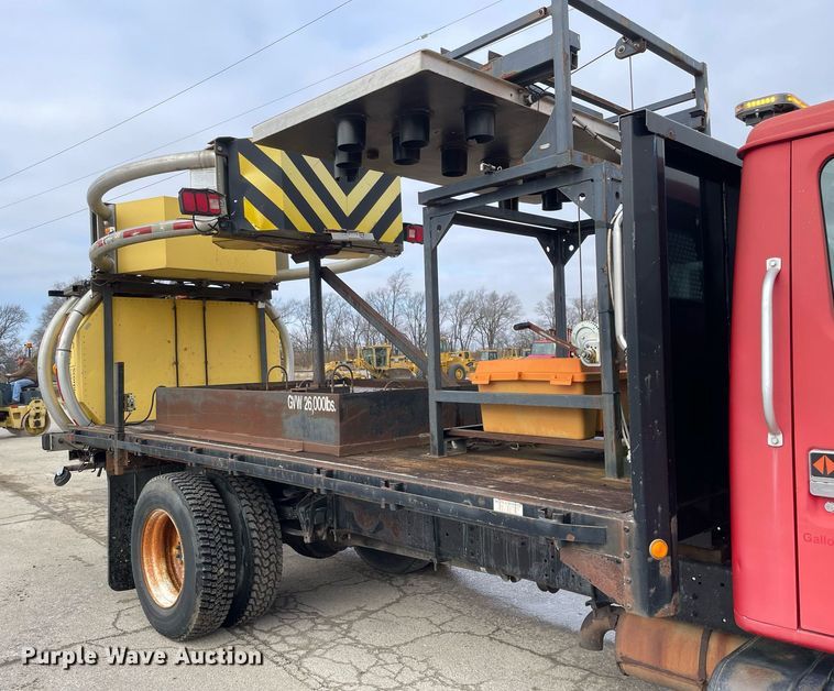 image for item DP0265 2000 International  4700 flatbed truck with crash attenuator