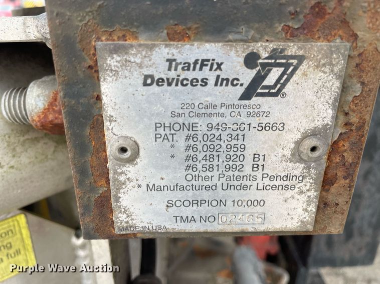 image for item DP0265 2000 International  4700 flatbed truck with crash attenuator