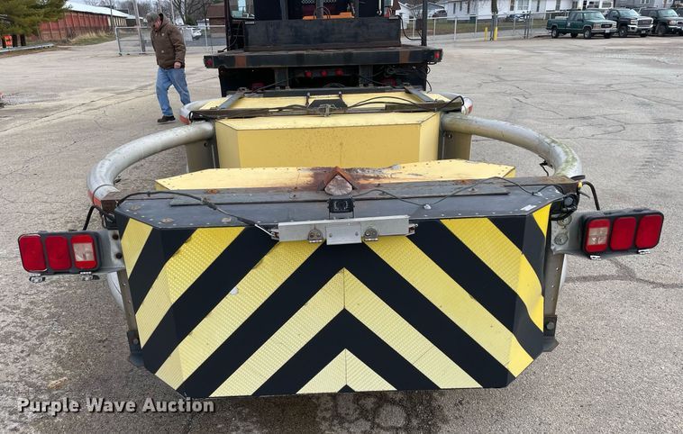 image for item DP0265 2000 International  4700 flatbed truck with crash attenuator