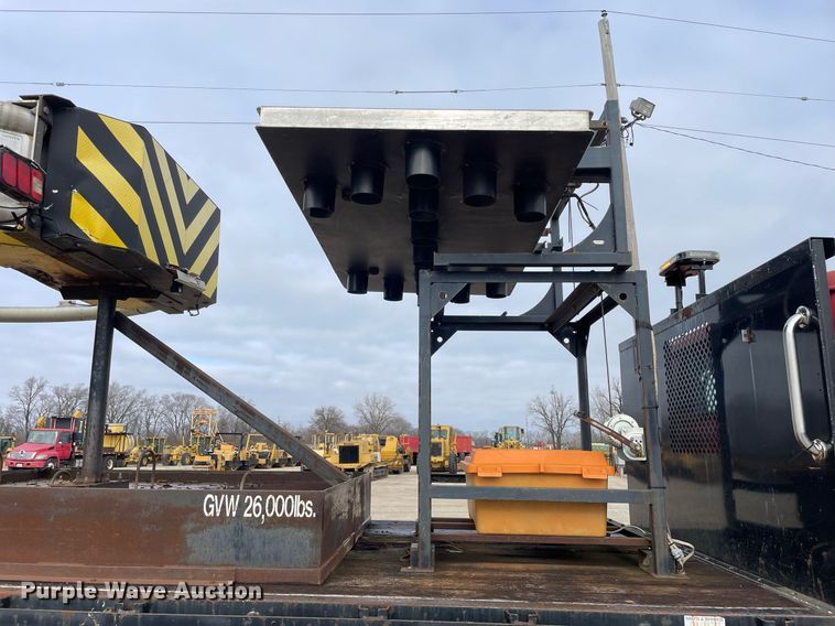 image for item DP0265 2000 International  4700 flatbed truck with crash attenuator