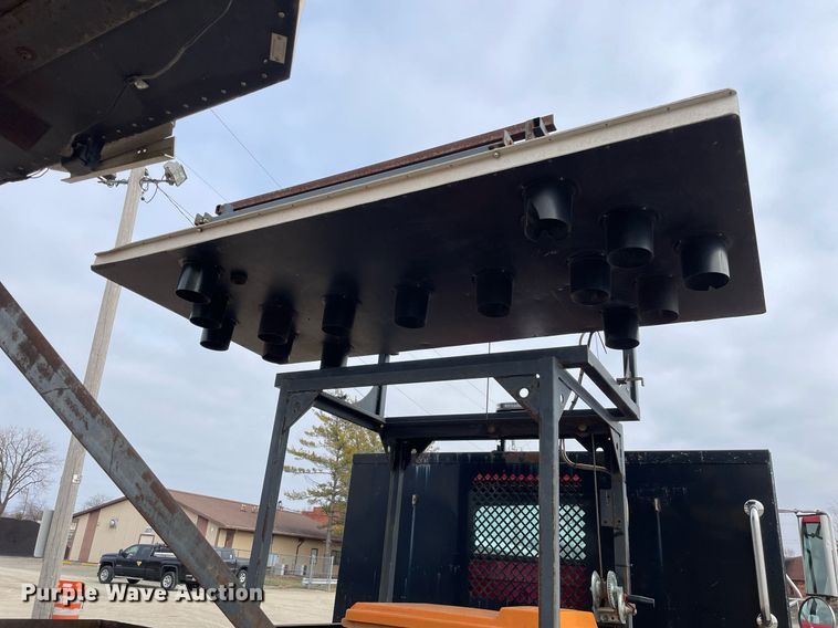 image for item DP0265 2000 International  4700 flatbed truck with crash attenuator