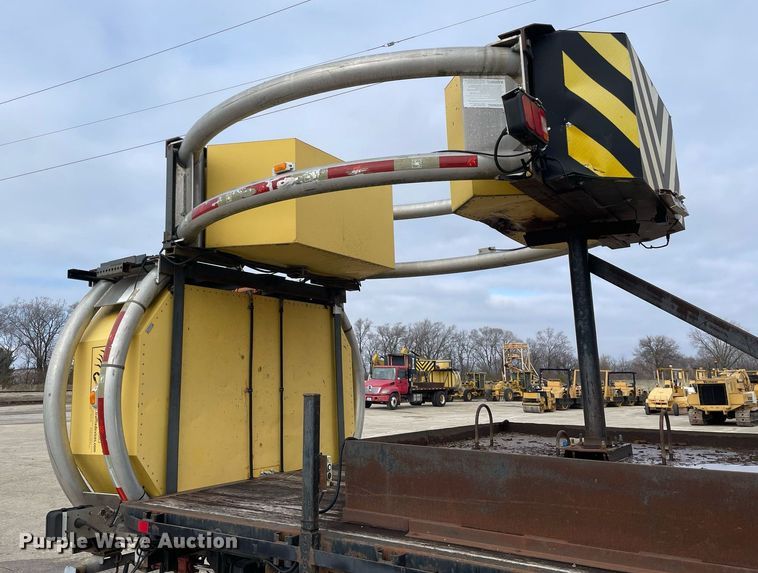 image for item DP0265 2000 International  4700 flatbed truck with crash attenuator